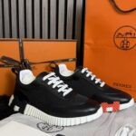 Hermès Bouncing Sneaker Black & White Orange H