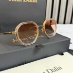 John Dalia Harrison Gold With Red & Orange Glasses